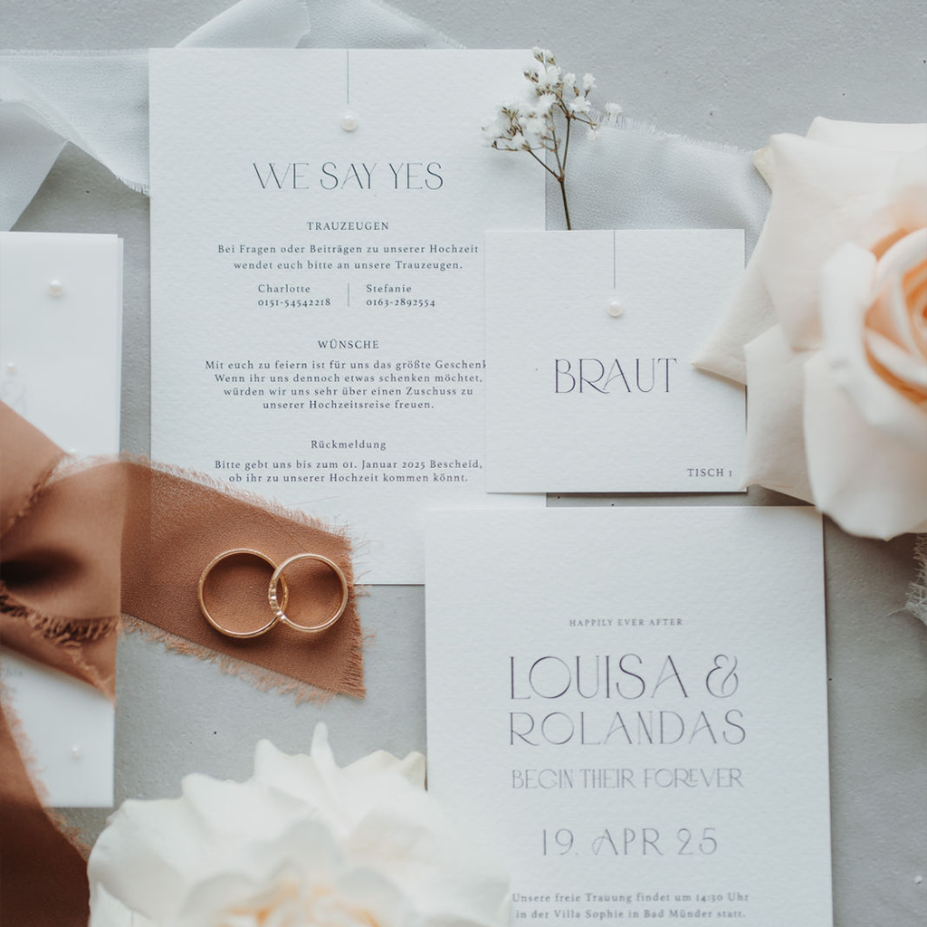 Hochzeitseinladung veredelt mit Perlen